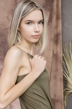 Samara Parts Her Slender Thighs So Her Shaved Pussy Pouts Open