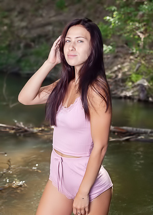 Melania Splashing Herself So Her Wet Shirt Clings To Her Perky Breasts Alluringly