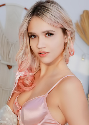 Novella Night Giving Her Perfect-handful Breasts A Squeeze