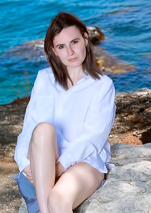 Nika Smiling With Pleasure As The Stimulating Ocean Breeze Caresses Her Sexy Body