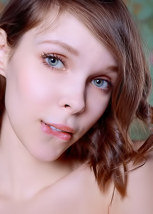 Kitty Gem Flaunts Her Allure With Daring Striptease In Stockings And Garter Belt