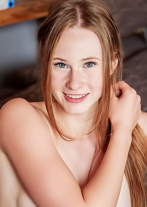 Zuzanna Shows Off Her Pretty Blue Eyes And Natural Curls In Lingerie